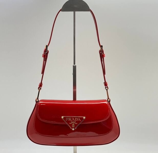 Сумка Prada женский кожа бордовый 149591