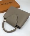 Сумка Louis Vuitton Capucines женский кожа 76634-3