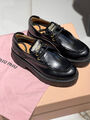 Лоферы Miu Miu женский кожа черный 130385-4