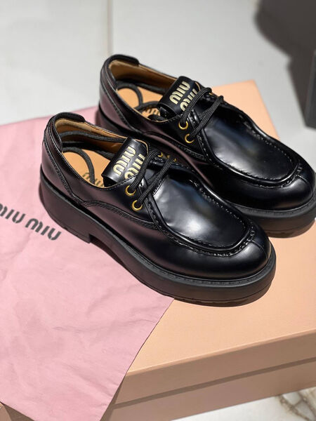 Лоферы Miu Miu женский кожа черный 130385-4