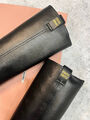 Сапоги Miu Miu женский кожа черный 128434-3