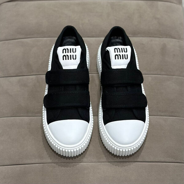 Кеды Miu Miu женский текстиль черный 110944-4