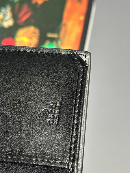 Мужской портмоне Gucci мужской кожа черный 154015-6