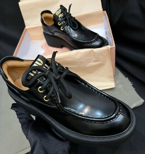 Ботинки Miu Miu женский кожа черный 128209