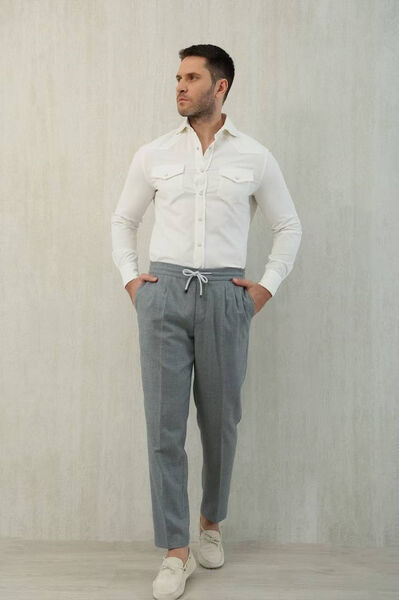 Мужские брюки Brunello Cucinelli мужской графитовый 174334-3