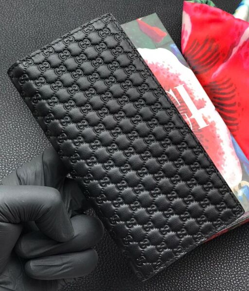 Мужской бумажник Gucci мужской кожа черный 105303