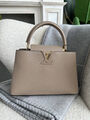 Сумка Louis Vuitton Capucines женский кожа 76634-5
