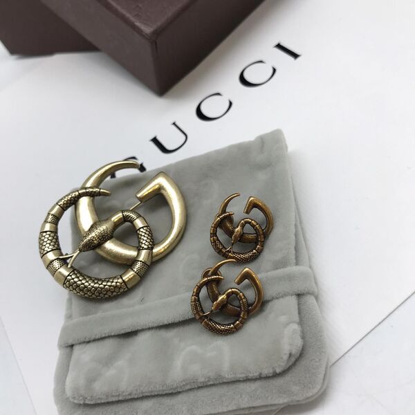 Брошь Gucci бронзовый 10504-2