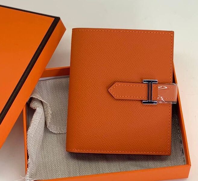 Кошелек Hermès женский кожа оранжевый 103063