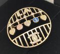 Брошь Chanel бронзовый 10372-1