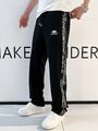 Мужские брюки Balenciaga мужской черный,серебристый w3034797-1