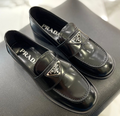 Лоферы Prada женский кожа черный 40915-1