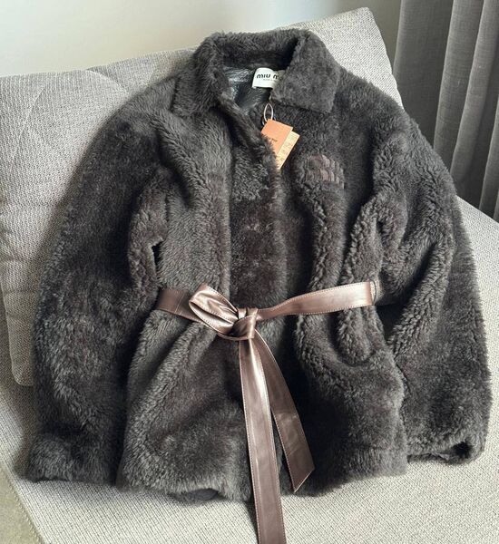 Дубленка Miu Miu женский кожа swift черный,коричневый 168335