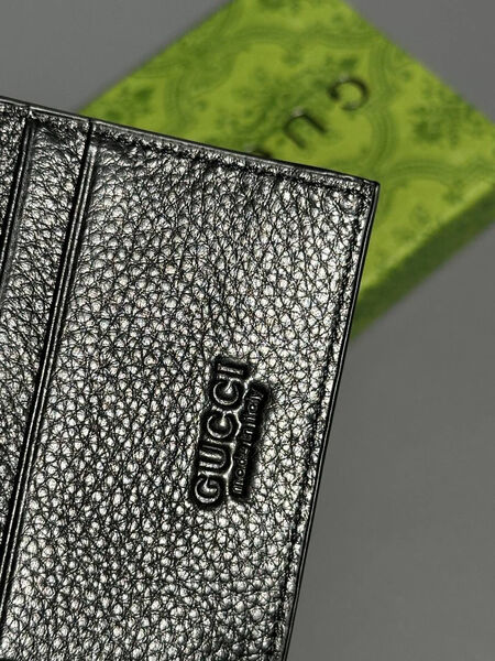 Мужской портмоне Gucci мужской кожа черный 154031-6