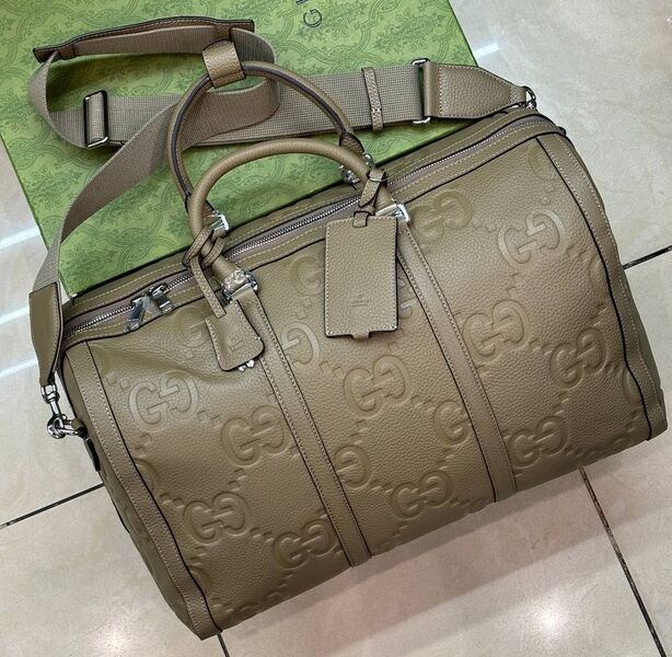 Дорожная сумка Gucci мужской кожа бежевый 175706