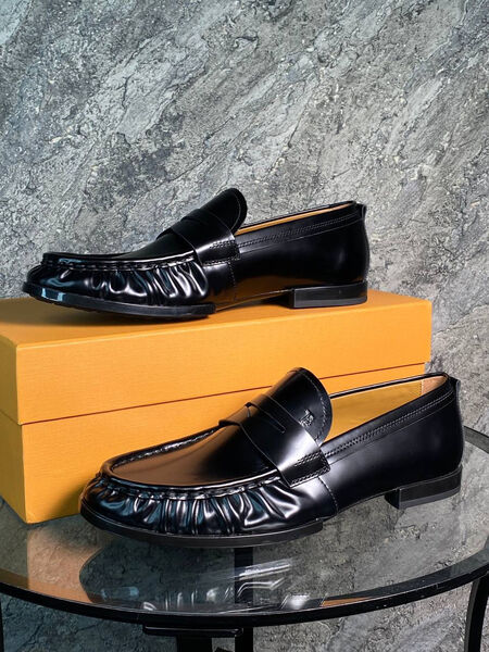 Мужские лоферы Tods мужской кожа черный 159393-4