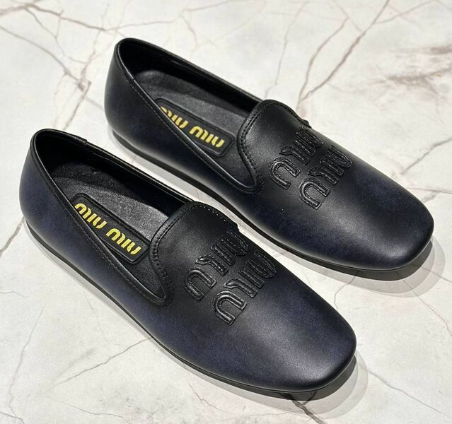 Лоферы Miu Miu женский кожа черный 152574