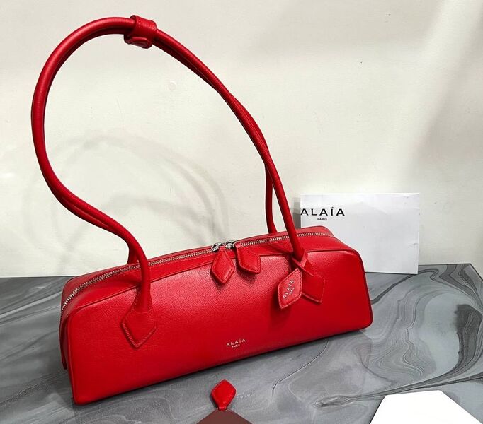 Сумка Alaïa женский кожа бордовый 152509