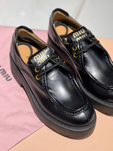 Лоферы Miu Miu женский кожа черный 130385-5