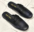 Шлепки Miu Miu женский кожа черный 152592-1