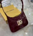 Сумка Dolce & Gabbana женский кожа бордовый 155070-2