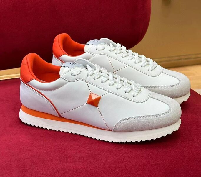 Кроссовки Valentino женский кожа оранжевый 98435