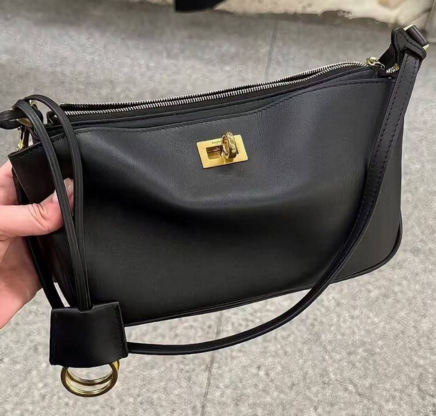 Сумка Balenciaga Sling Pochette женский кожа черный 170966-4