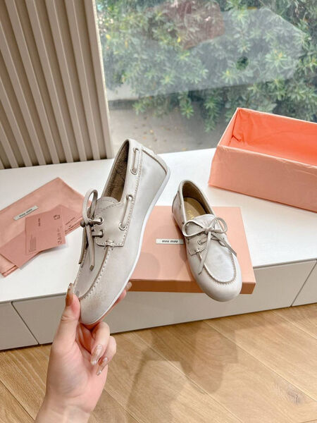 Лоферы Miu Miu женский кожа бежевый 138164-5