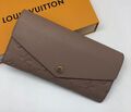 Кошелек Louis Vuitton женский кожа swift бежевый 31942