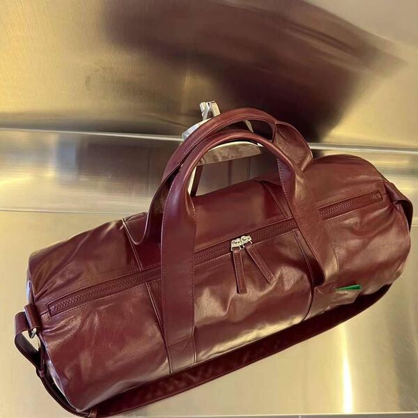 Дорожная сумка Bottega Veneta мужской кожа бордовый 120673-5
