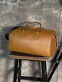 Дорожная сумка Prada мужской кожа горчичный 19283-3