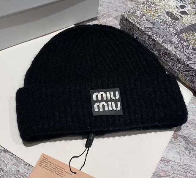 Шапка Miu Miu женский вязаная ткань черный 130147
