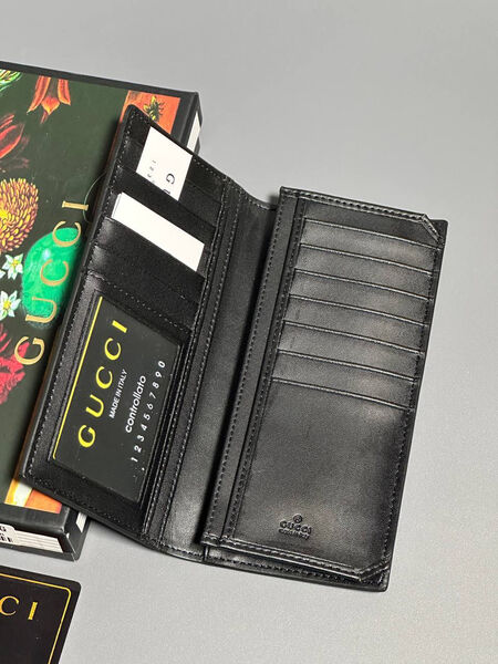 Мужской портмоне Gucci мужской кожа черный 154015-4