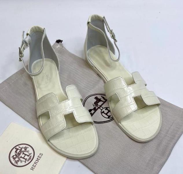 Сандалии Hermès женский кожа белый 66612
