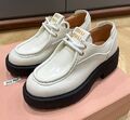 Ботинки Miu Miu женский кожа молочный 128203