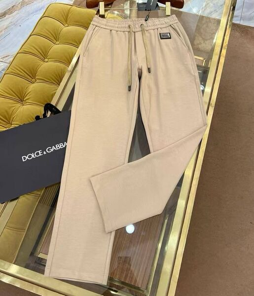 Мужские брюки Dolce & Gabbana мужской бежевый 184641