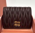 Портмоне Miu Miu женский кожа страуса черный,коричневый 137747
