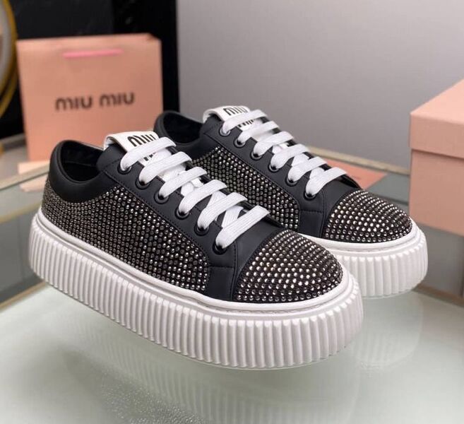 Кеды Miu Miu женский кожа черный 136072