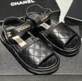 Босоножки Chanel женский кожа swift черный,коричневый 146817