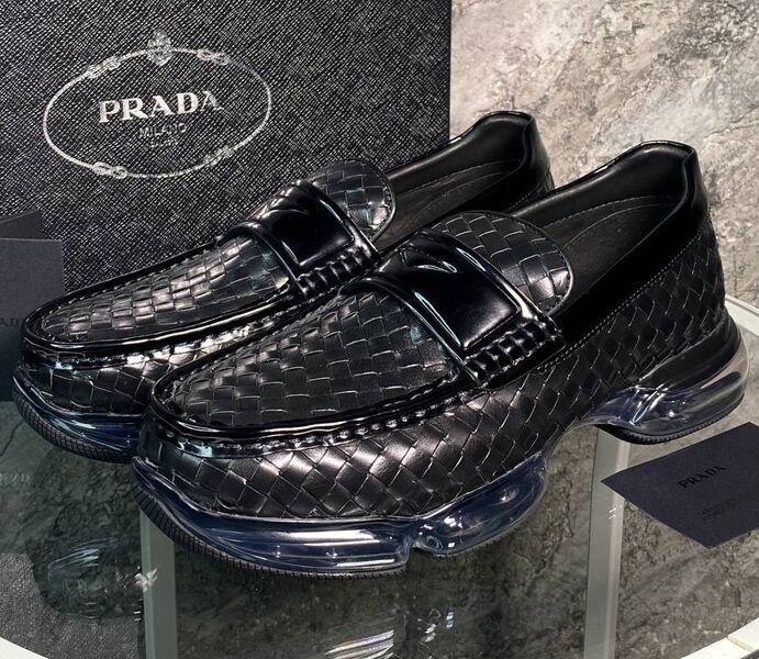 Мужские лоферы Prada мужской кожа черный 145429