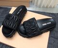 Шлепки Miu Miu женский кожа черный 109207-1