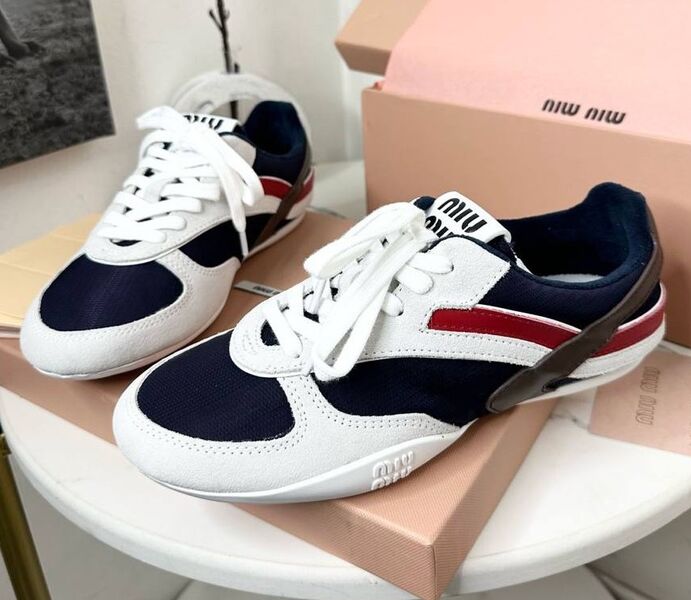 Кроссовки Miu Miu женский текстиль черный 180356
