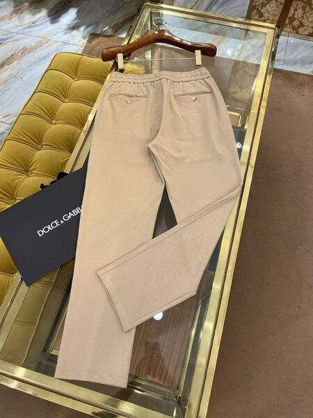 Мужские брюки Dolce & Gabbana мужской бежевый 184641-3