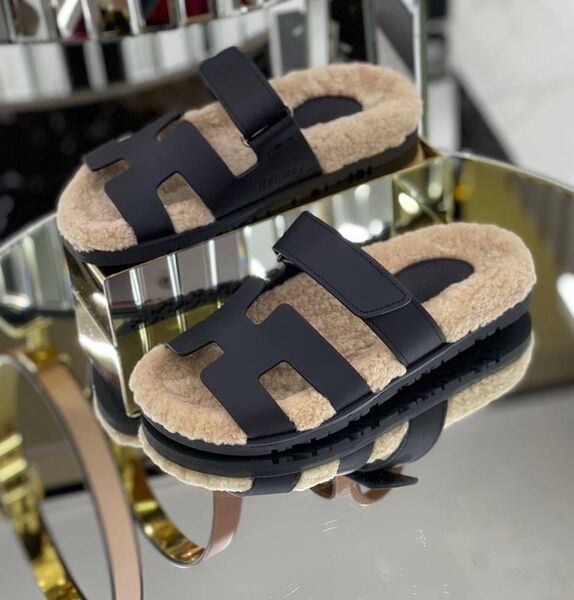 Тапочки Hermès женский кожа черный 78227