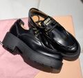 Лоферы Miu Miu женский кожа черный 130385-1