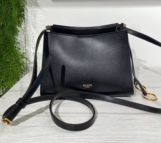 Сумка Alaïa женский кожа черный 194408