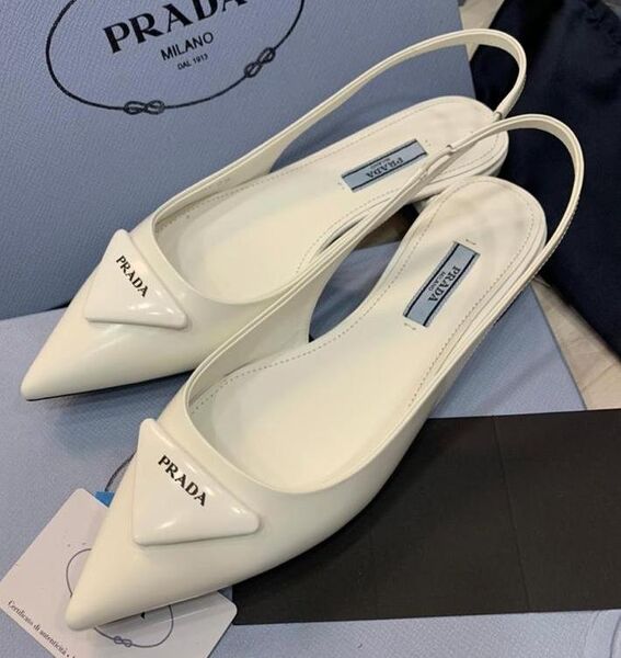 Босоножки Prada женский кожа белый 5480