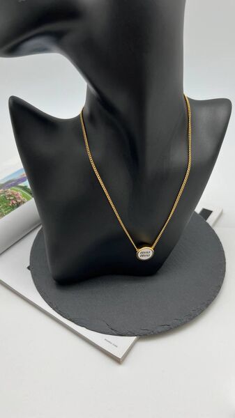 Колье Miu Miu бронзовый 176001-2