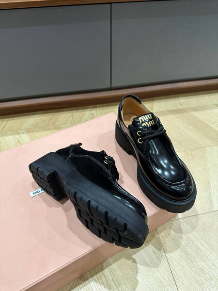 Ботинки Miu Miu женский кожа черный 128209-2