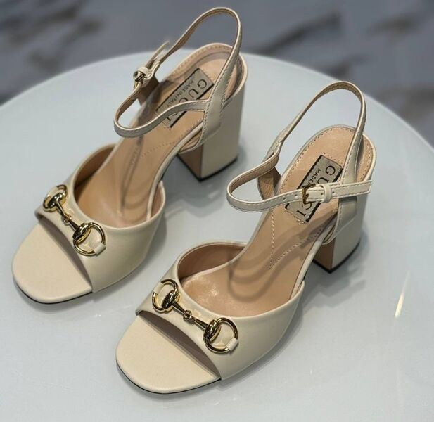 Босоножки Gucci женский кожа бежевый 189469